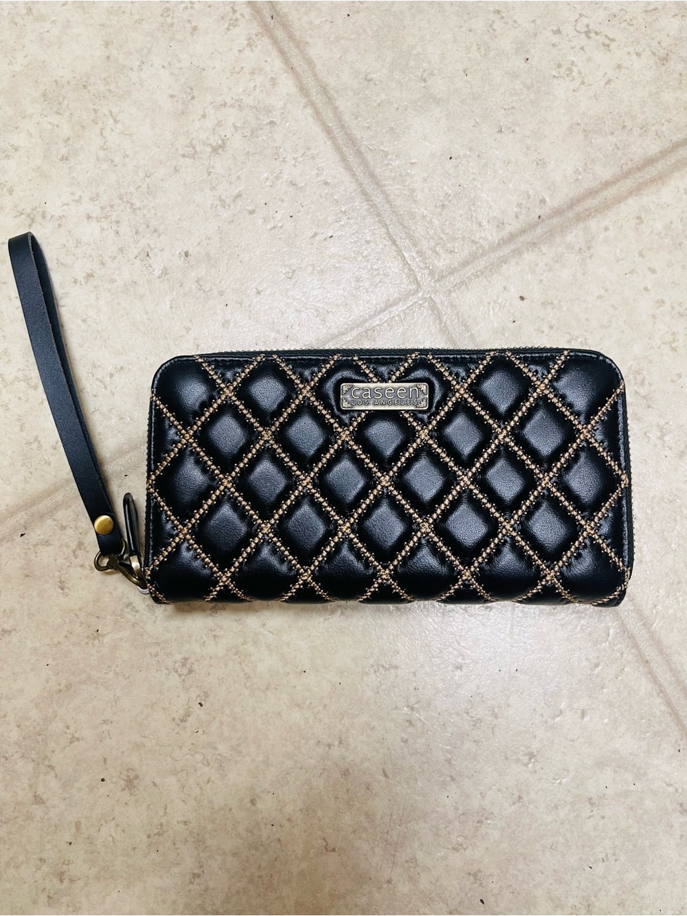 Black Quilted Caseen Women’s Wallet with Gold Stitching